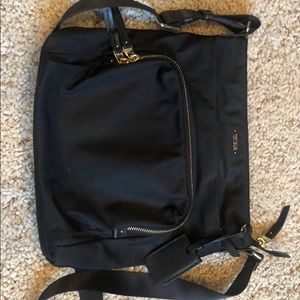Tumi cross body purse